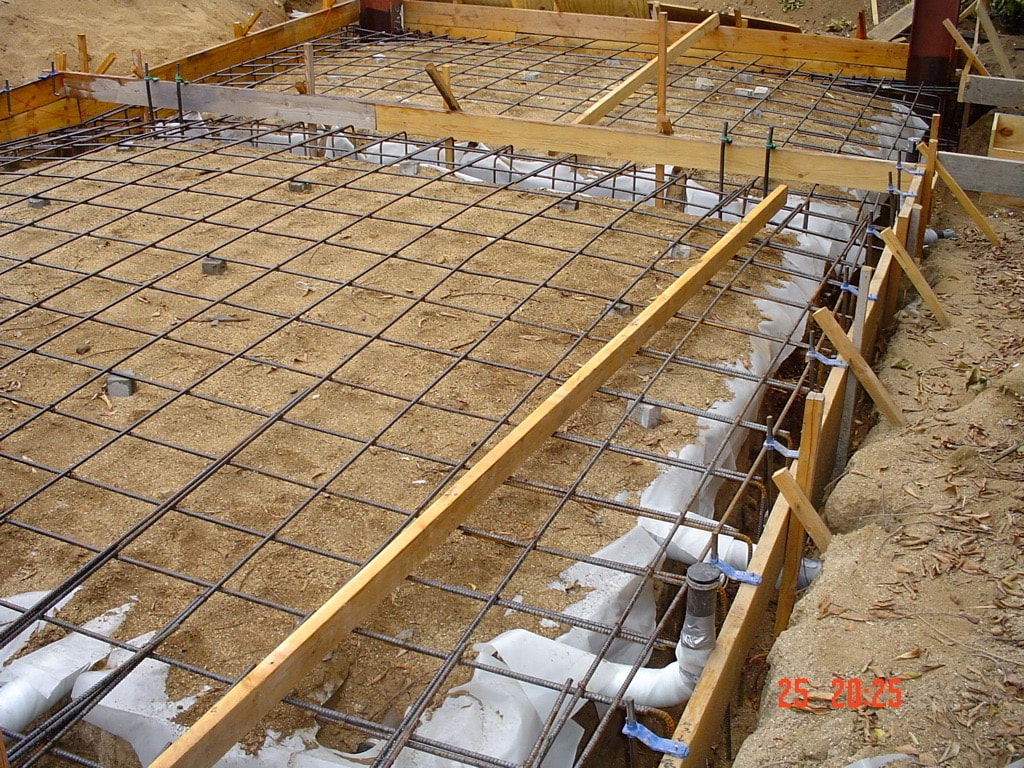 New concrete foundation formed with rebar reinforcement under construction in Hollywood, CA by Concrete Etc., Inc.