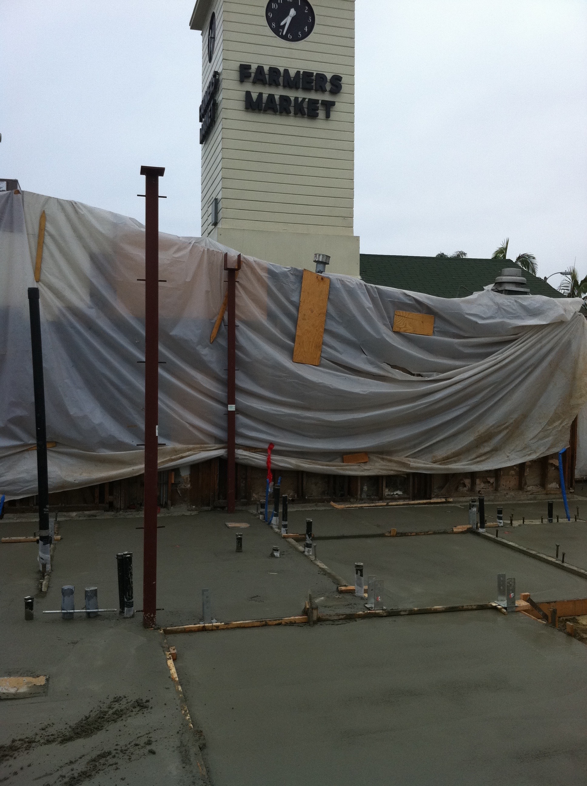Concrete slab pour with anchor bolts at The Grove Farmers Market Los Angeles — Concrete Etc., Inc.
