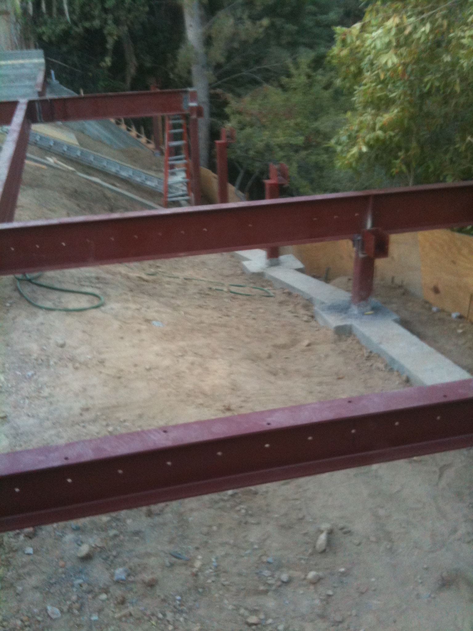 Steel frame and excavation for hillside foundation construction in Los Angeles County by Concrete Etc., Inc.