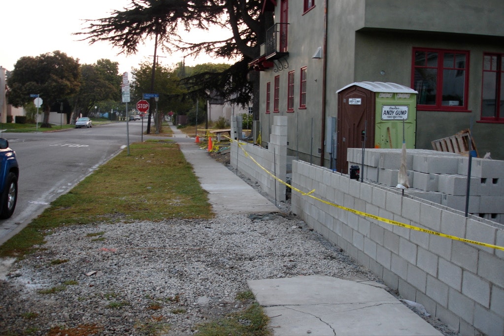 Natural stone masonry wall construction by Concrete Etc. in Santa Clarita