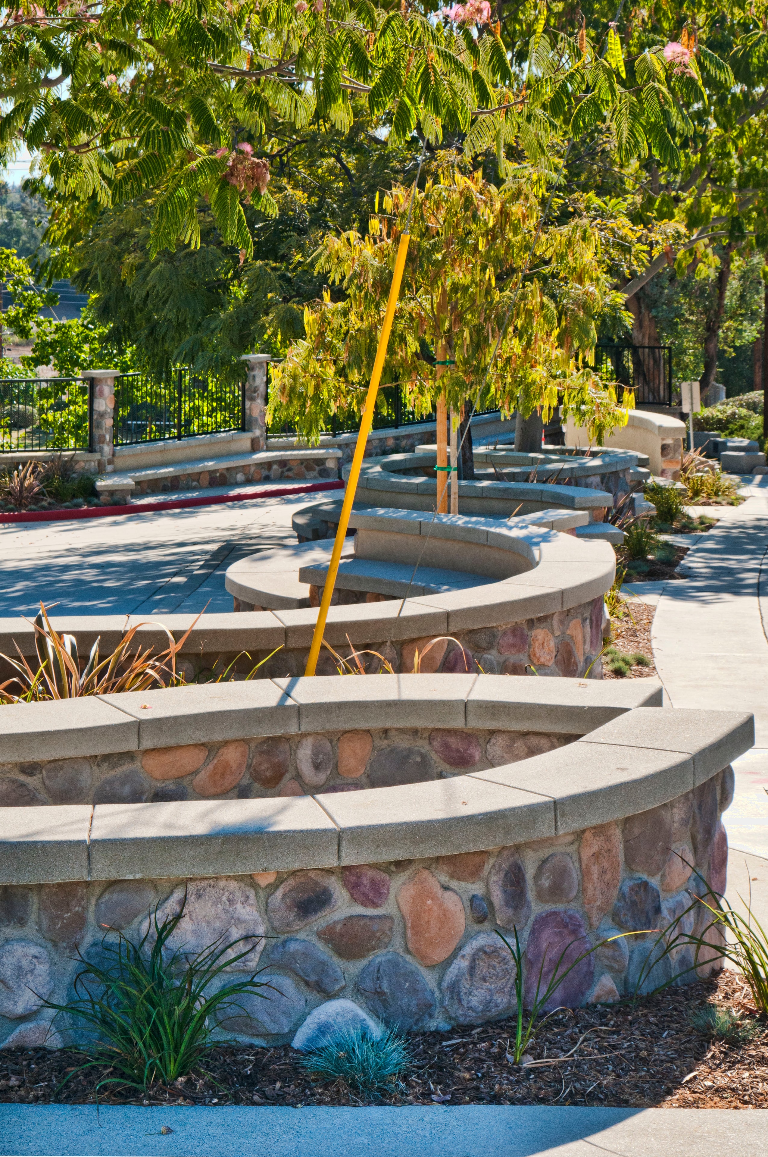 Masonry seating walls and planters by Concrete Etc.
