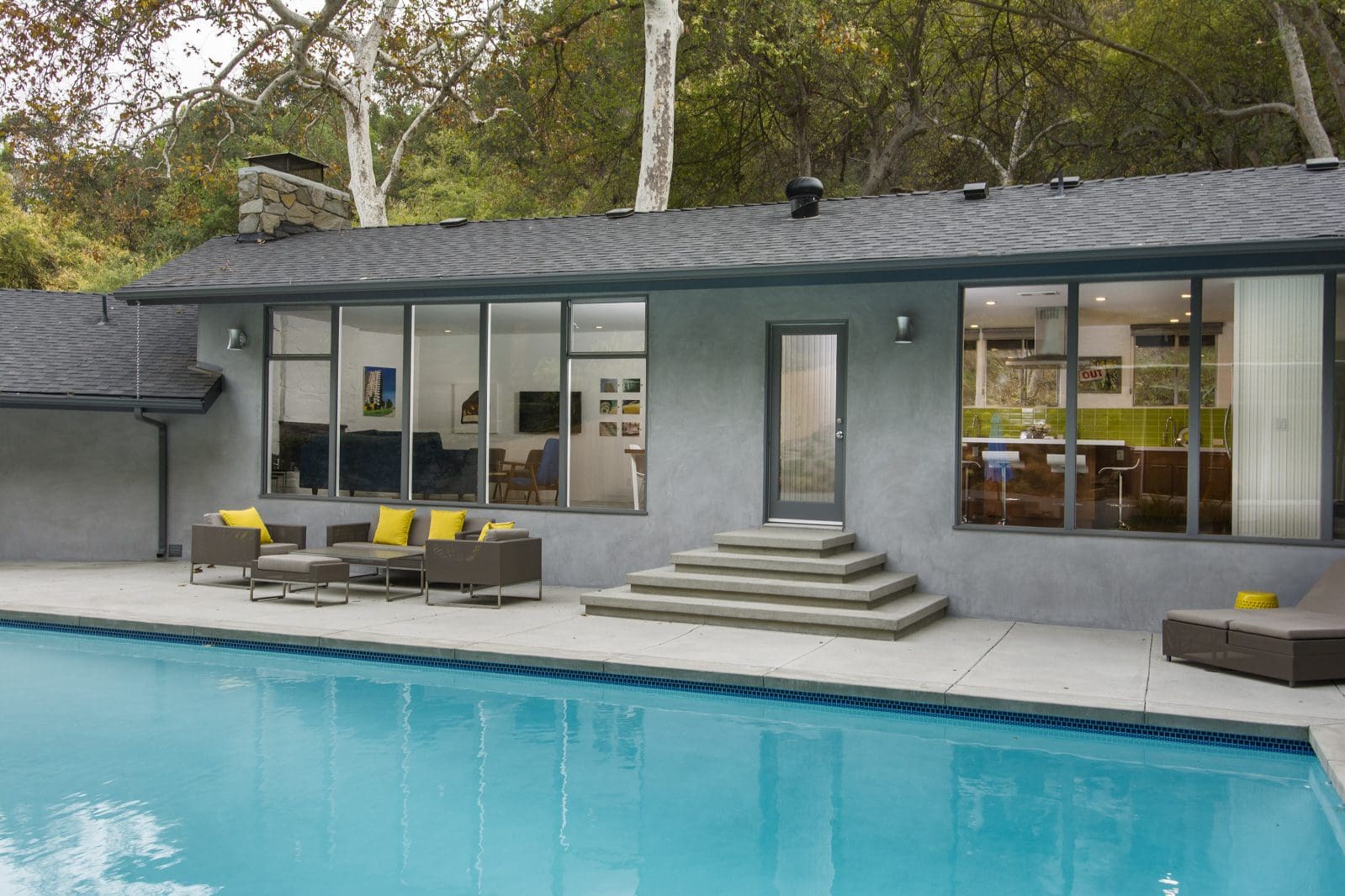 Sand Finish concrete pool deck with steps and coping installed by Top-Rated Concrete Contractor in Santa Clarita | Concrete-etc.com