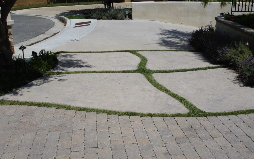 stamped-concrete-driveway-with-decorative-grass-joints-and-paver-stone-entry-los-angeles-contractor