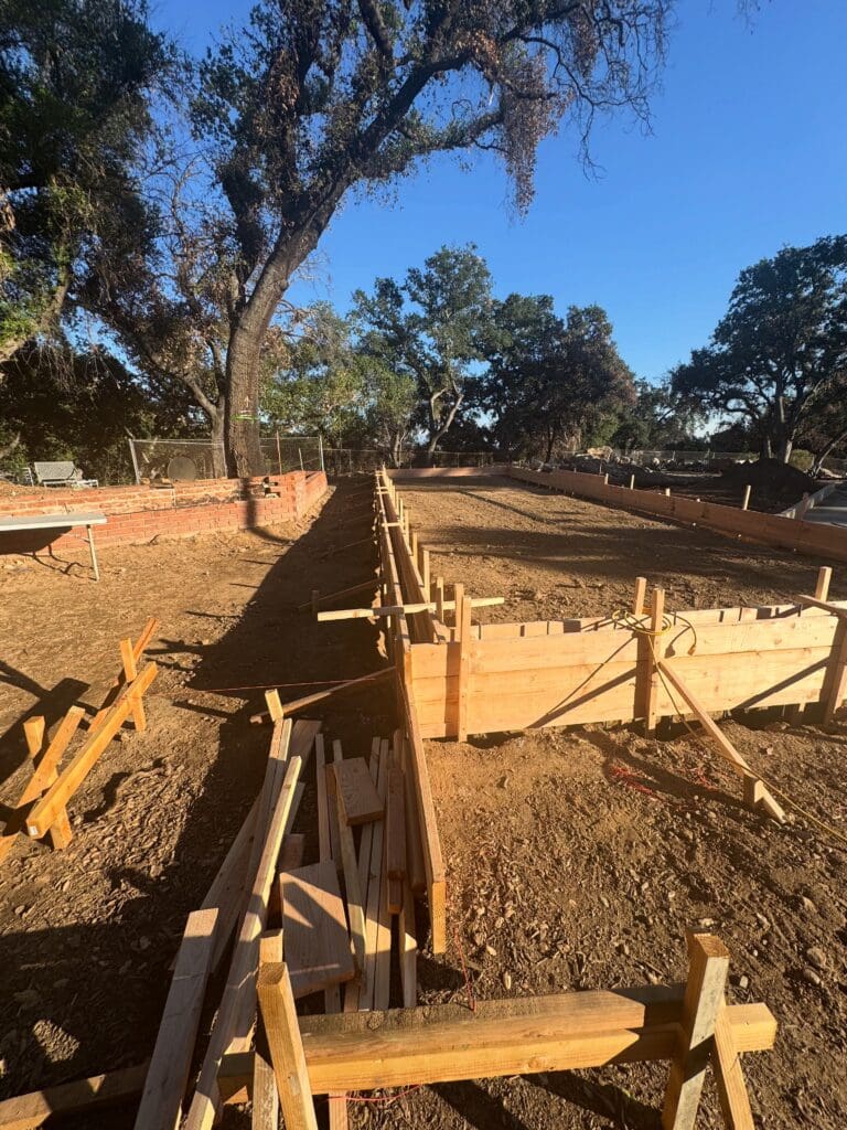 Concrete formwork and footing setup for a new home foundation in Altadena, California, built by Concrete Etc., Inc.