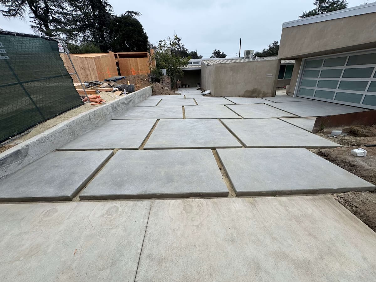 New sand finish concrete driveway installation in Altadena, Los Angeles County by Concrete Etc.