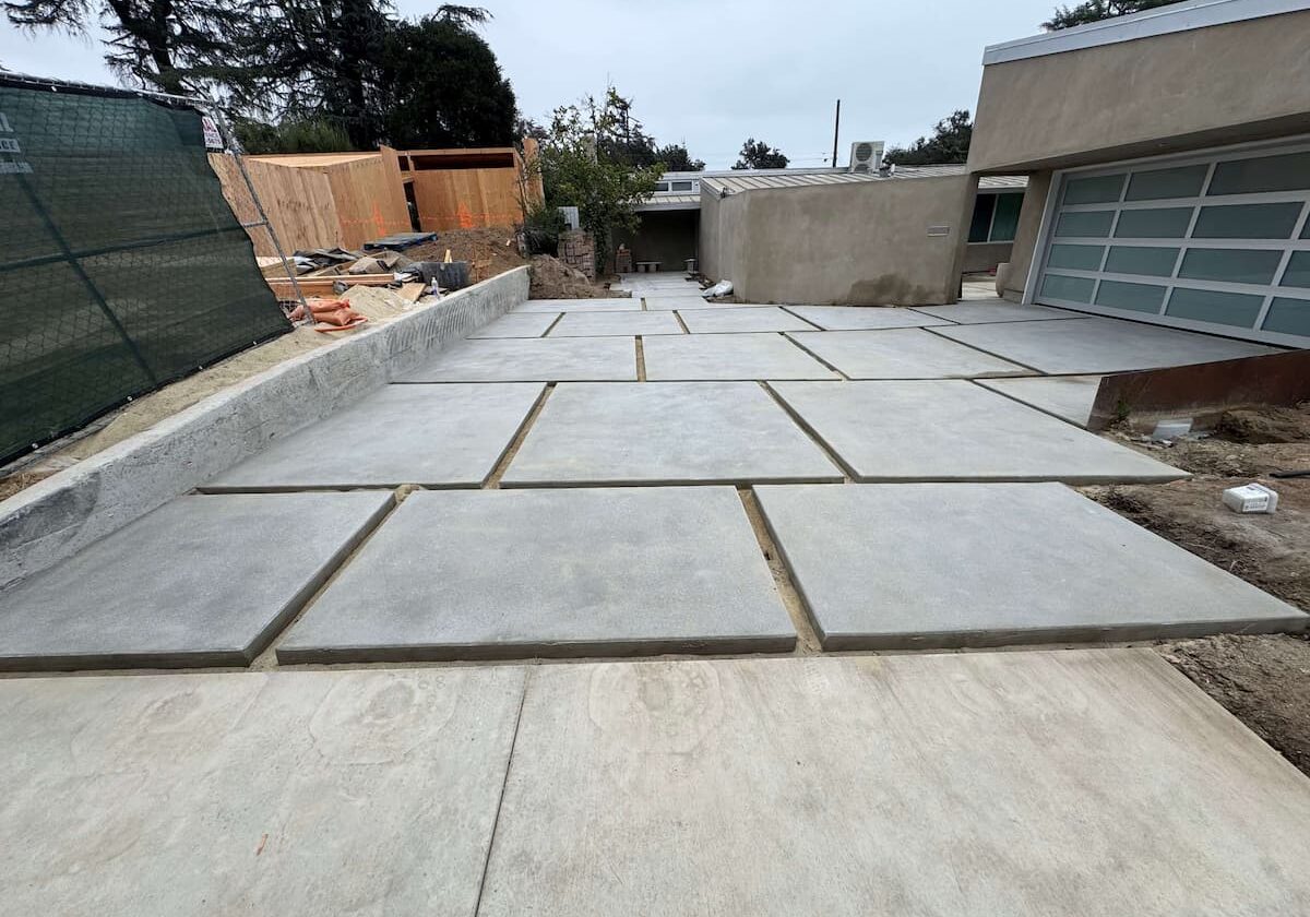 New sand finish concrete driveway installation in Altadena, Los Angeles County by Concrete Etc.